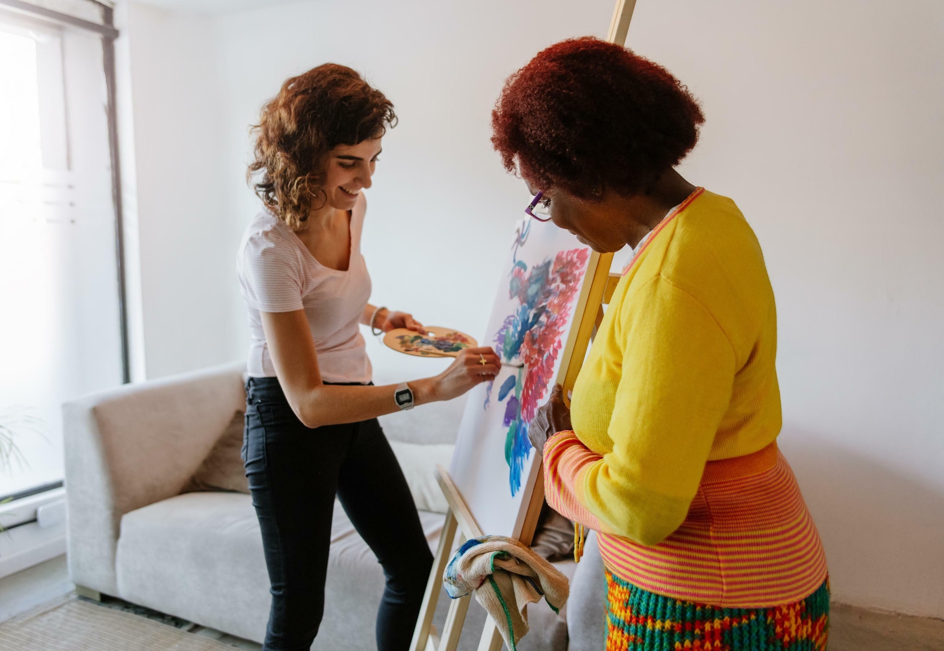 Canva Woman Painting with Friend